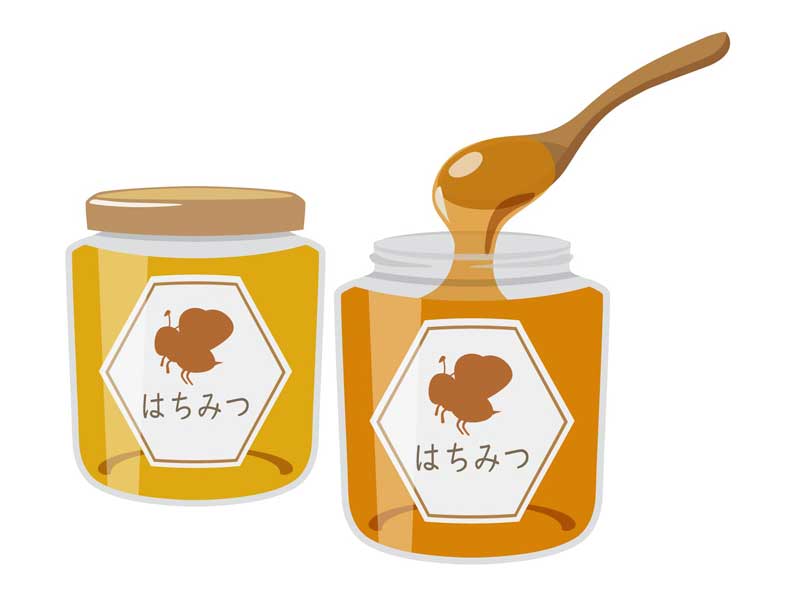 瓶に入ったはちみつのイラスト